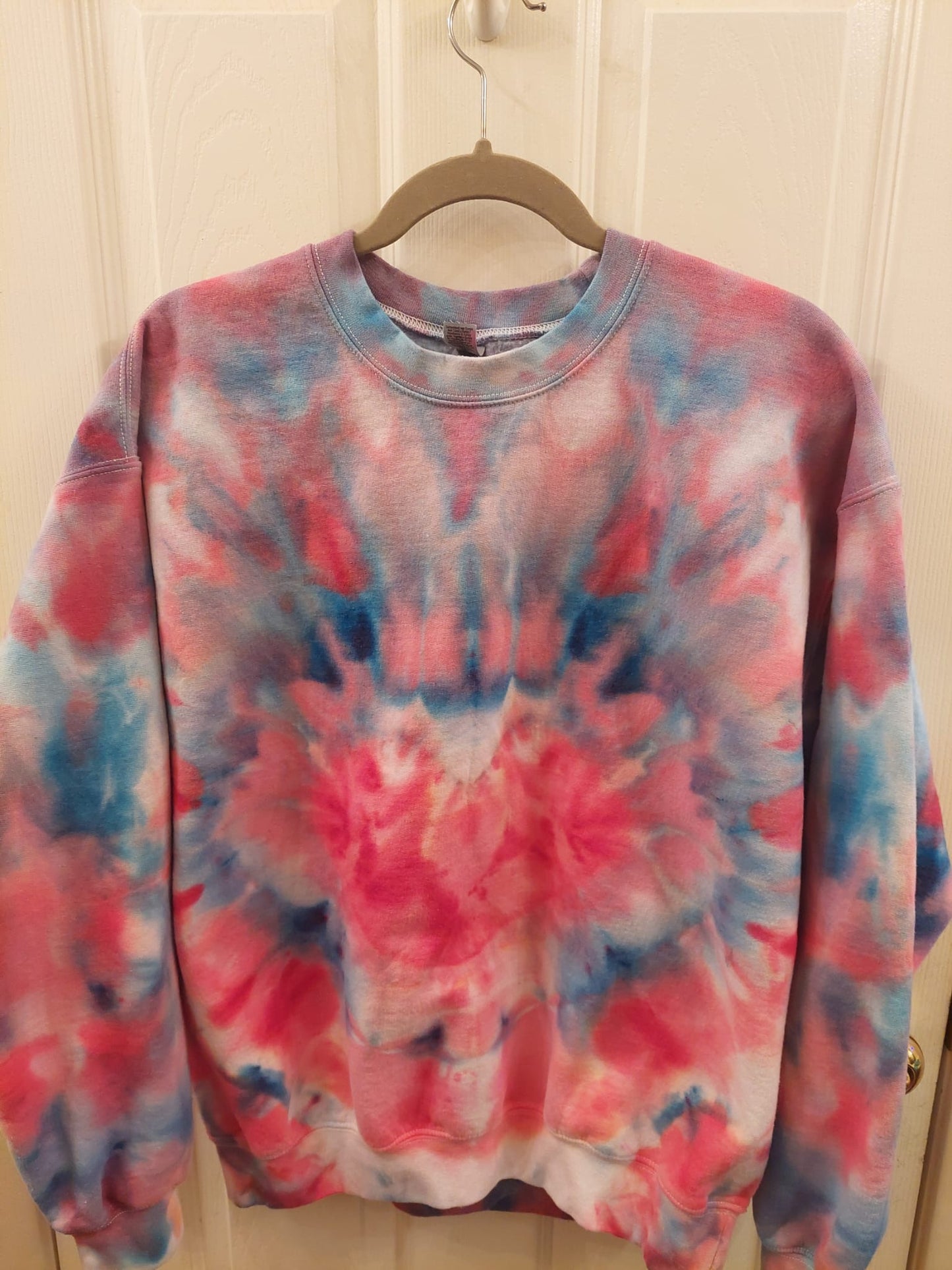 Heart Burst tie dye sweater front side 