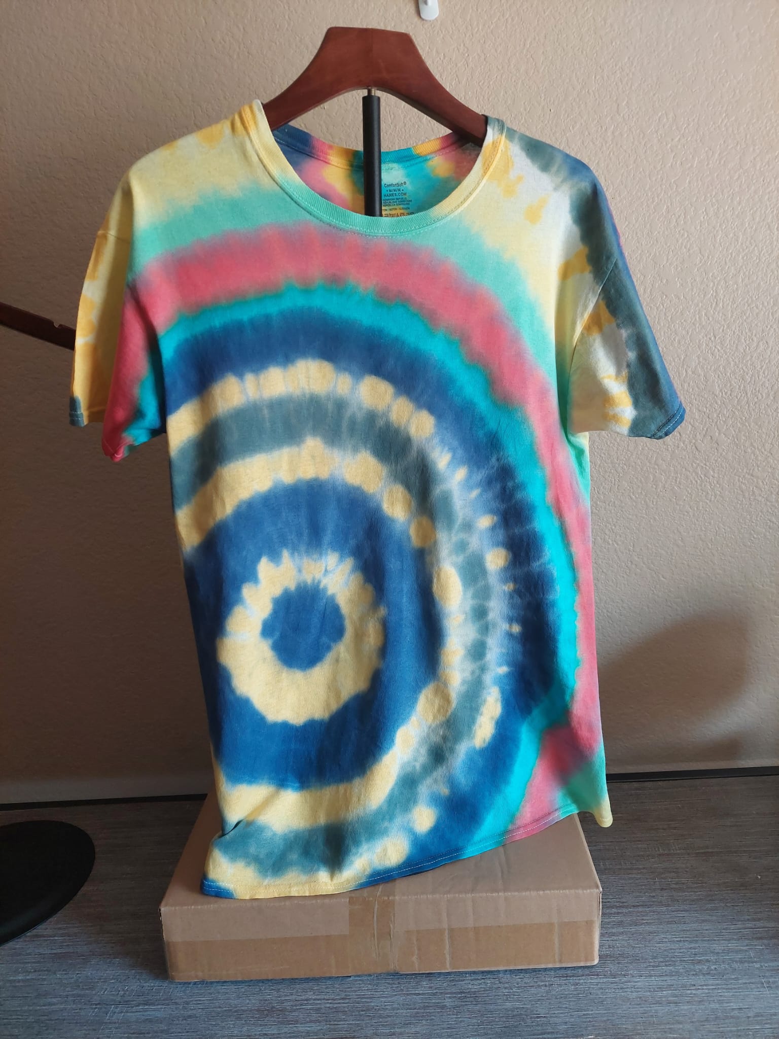 happy geode tie dye t-shirt colors yellow green blue red style circular from the left side 